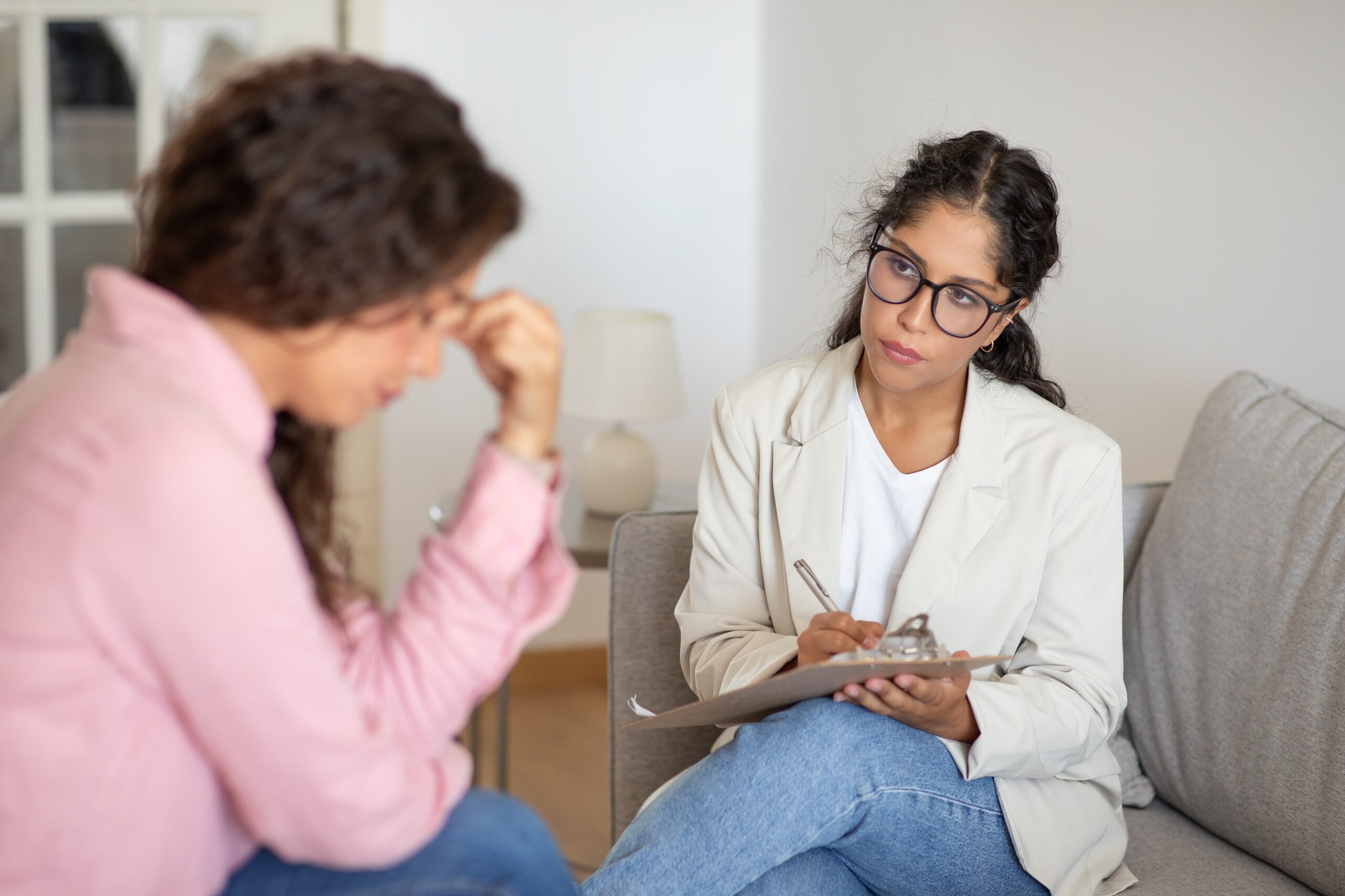 Therapist supporting a client recovering from self-medication