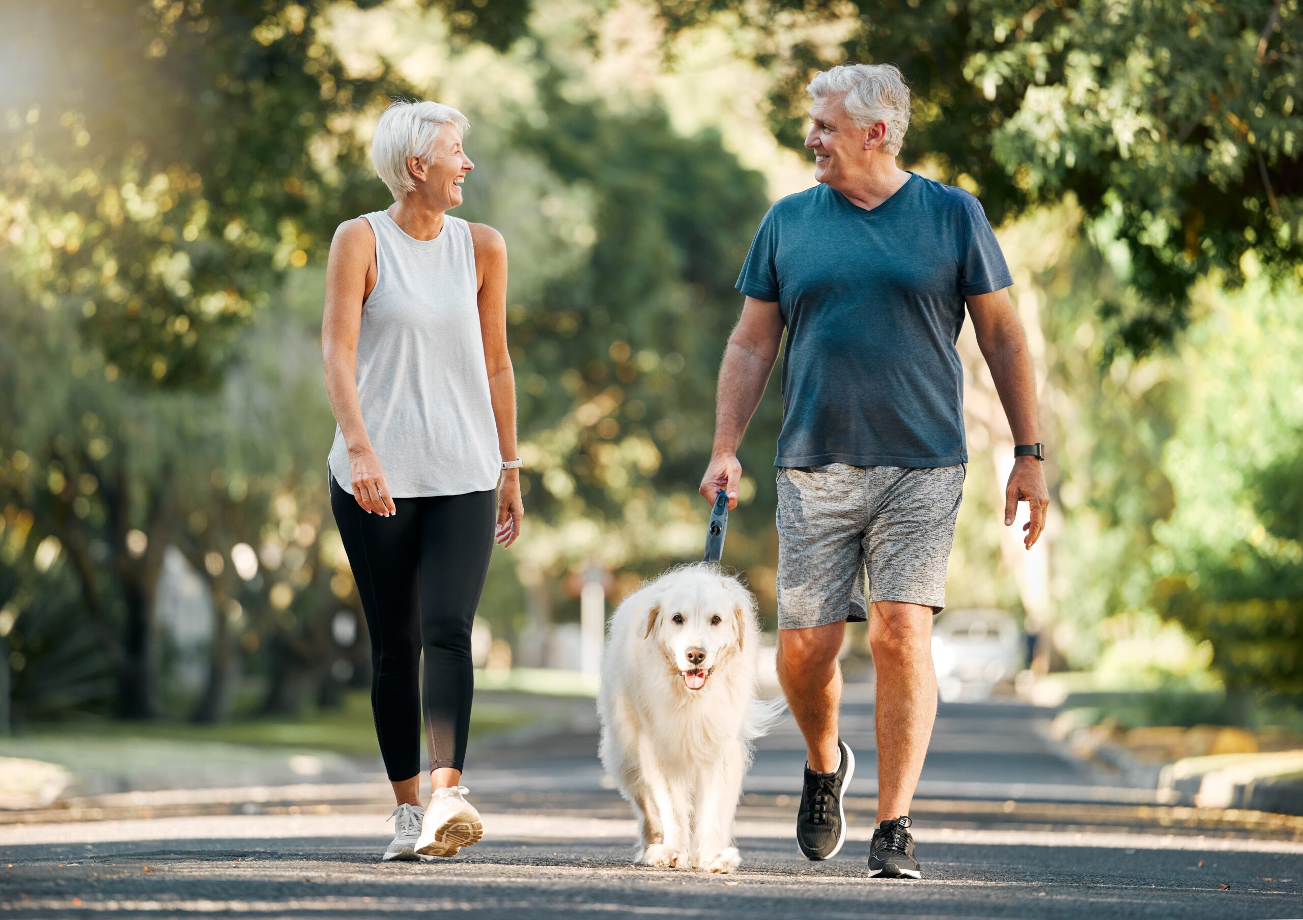 couple walking through a quiet neighborhood during recovery journey