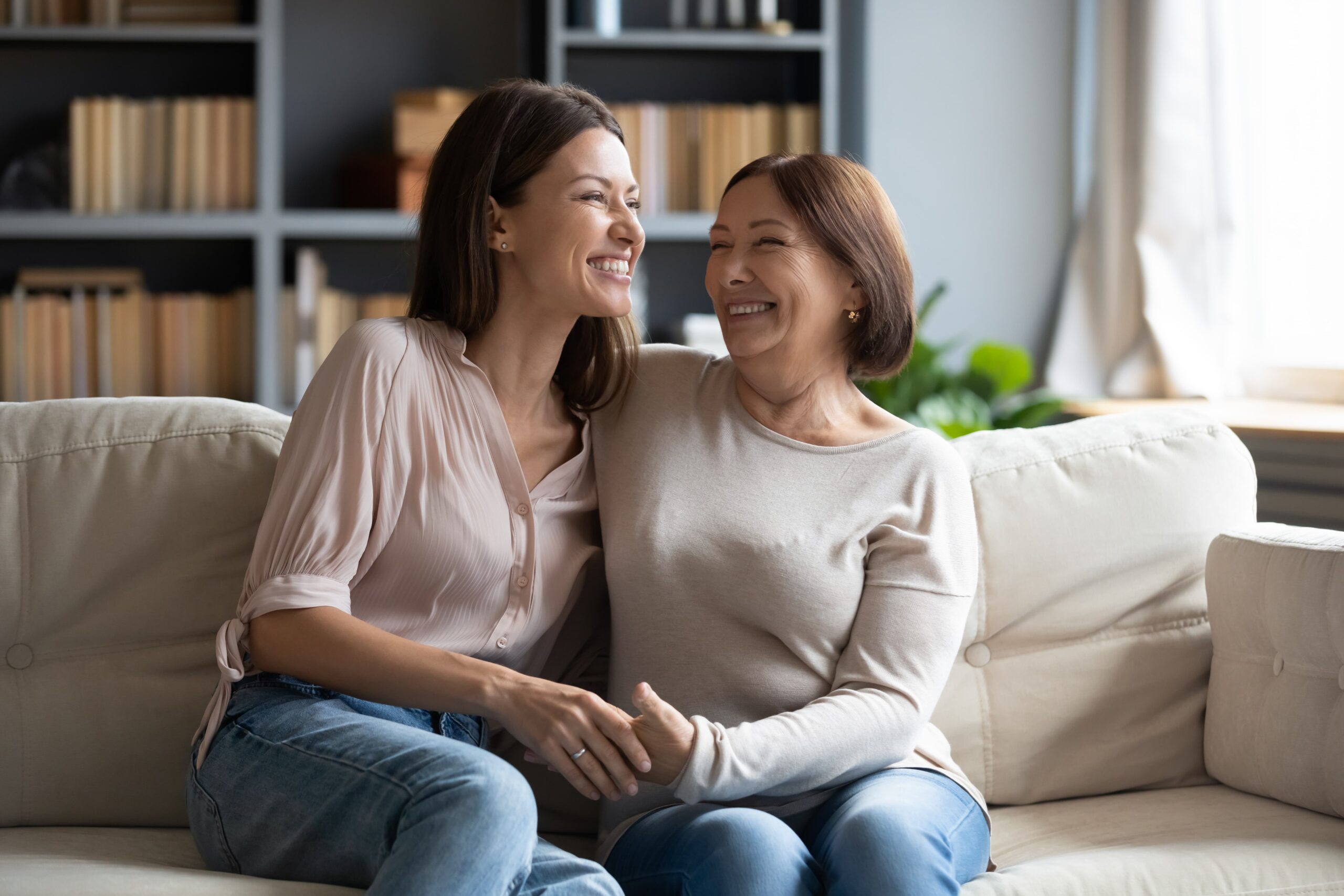 family offering emotional support to loved one in home setting