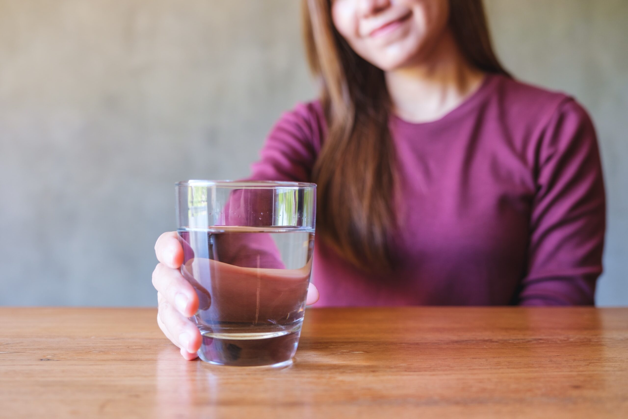 Person contemplating alcohol-free living as part of recovery journey